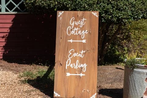 Signage at the event points the way. Stock Photos