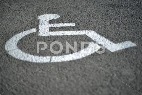 Signage for handicap on the road Stock Photos