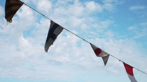 Signal code flags flutter on a light breeze Stock Footage 114682334
