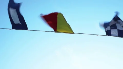 Signal code flags flutter on a strong wind Video stock 114682317