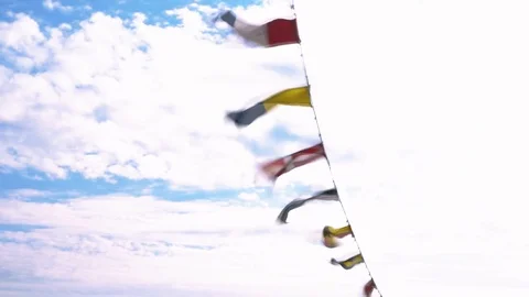 Signal code flags flutter on a strong wind Stock Footage 114682329