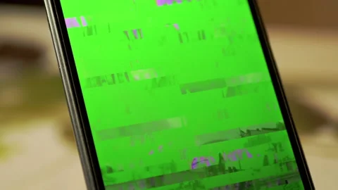 Signal Distortion, Interference, Glitches on Screen of a Smartphone. Close up Stock Footage 165834679