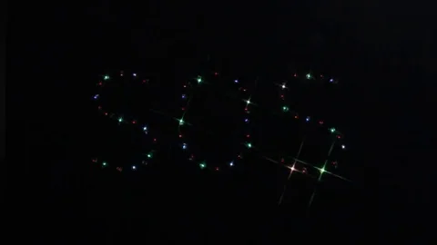 Signal for help glows in the dark Stock Footage 69300211