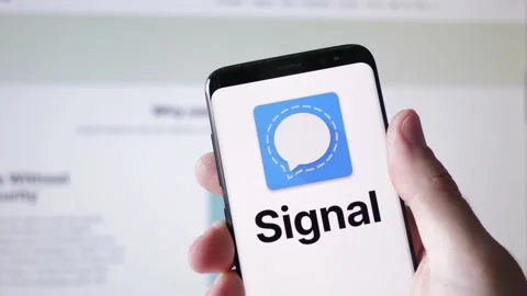 Signal Messaging app on a Smartphone and Computer Screen Stock Footage 152117775