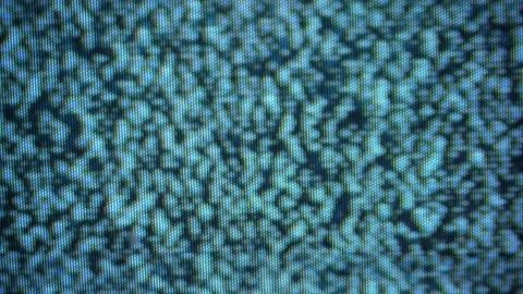 The signal on the screen snows close-up. White noise and no video signal on TV Stock Footage 238798837