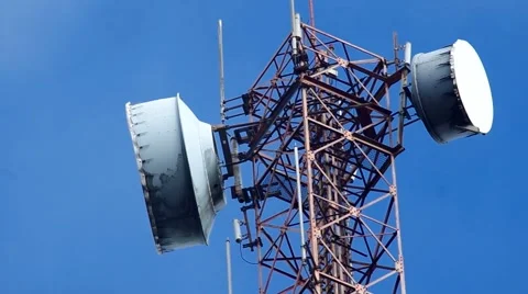 Signal transmitters on the tower under the cloud Stock Footage 57114275