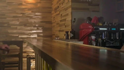 Signalling which drinks he wants Stock Footage 112191601