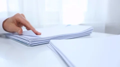 Signatures in reports. A stack of paper documents. Stock Footage