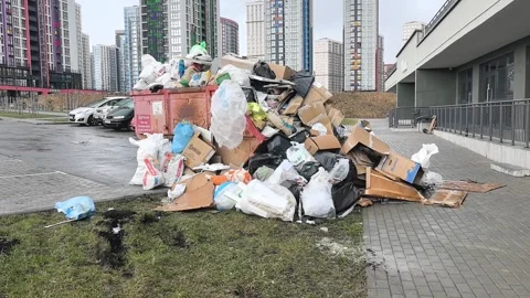 A significant accumulation of refuse can be seen in the bustling urban landscape Video stock 343770652