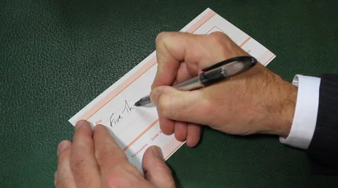 Signing Cheque Stock Footage 37897589