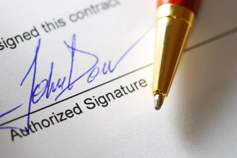 Signing a contract Stock Photos