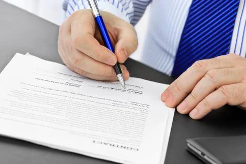 Signing a Contract Stock Photos
