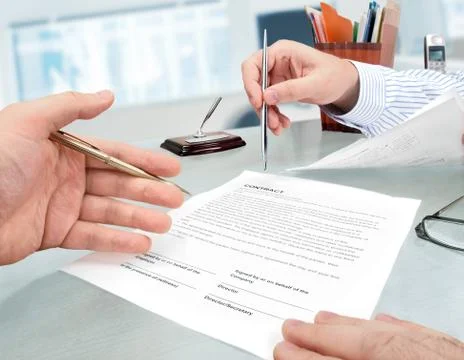 Signing a Contract Stock Photos