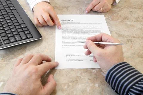 Signing a Contract Stock Photos