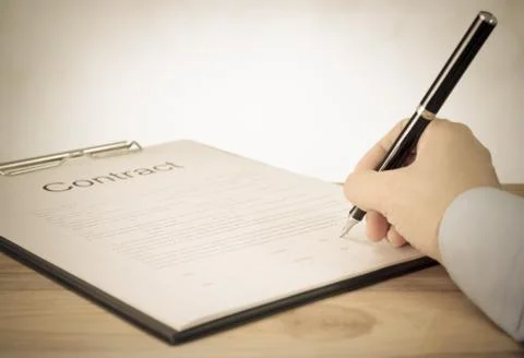 Signing contract Stock Photos