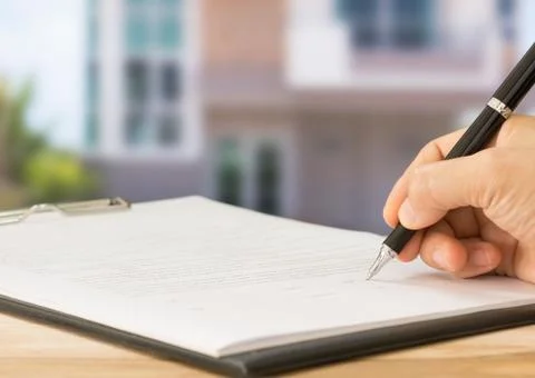 Signing contract Stock Photos