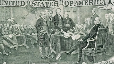 Signing declaration of independence on US two dollar bill tracking macro Stock Footage 122693502