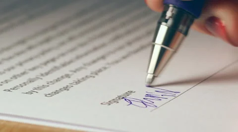 Signing Document, Close up of a woman's hand with pen Stock Footage 43219292