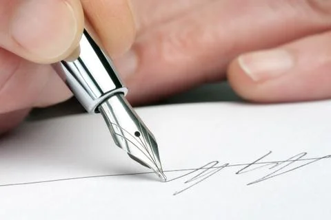 Signing a document 写真素材