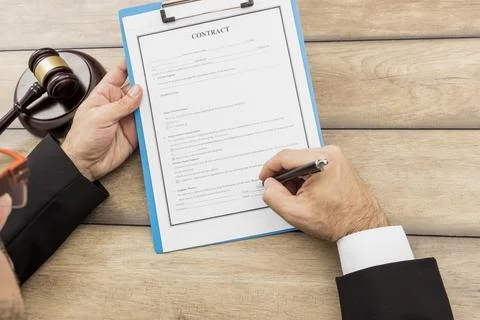 Signing documents. High quality and resolution beautiful photo concept Stock-Fotos