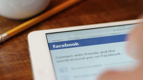 Signing in to Facebook on iPad Stock Footage 62052504