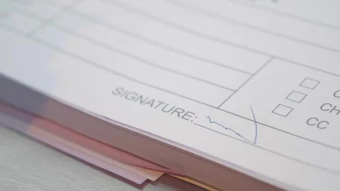 Signing an important document at an office desk Stock Footage 307751434