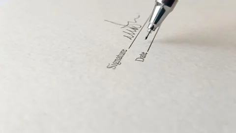 Signing a paper of contract Stock Footage 146248598