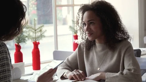Signing on tablet PC by young afro woman by finger Stock Footage 72651003