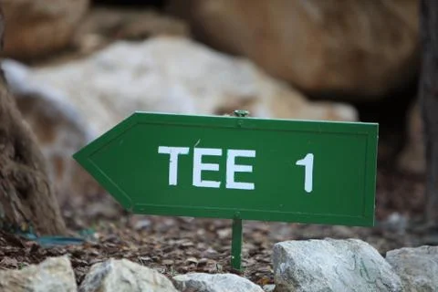 Signpost for the first tee on a golf course Stock Photos