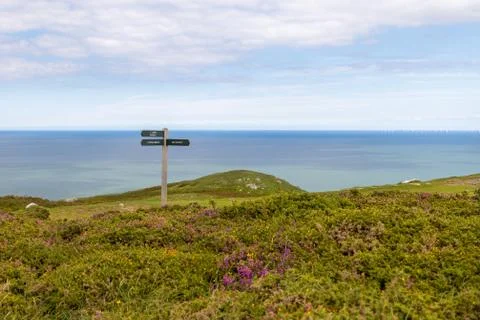 A signpost on the Great Orme mountain in Llandudno Фото