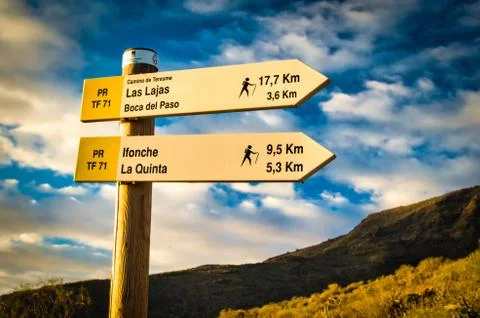 A signpost on a mountain path Stock Photos