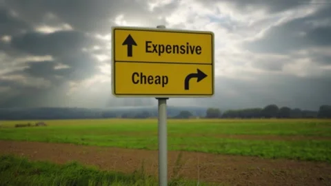 Signposts the direct way to Cheap versus Expensive Stock Footage 315586118