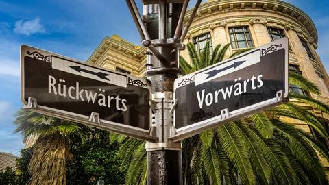 Signposts the direct way to forward versus backward 스톡 사진