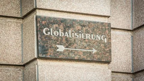 Signposts the direct way to Globalization Stock Photos