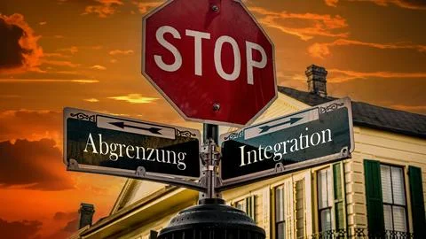 Signposts the direct way to integration versus demarcation Stock Photos