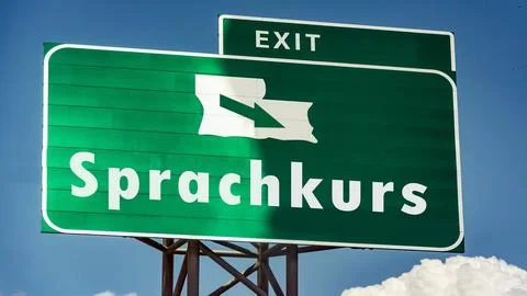 Signposts the direct way to Language course Stock Photos
