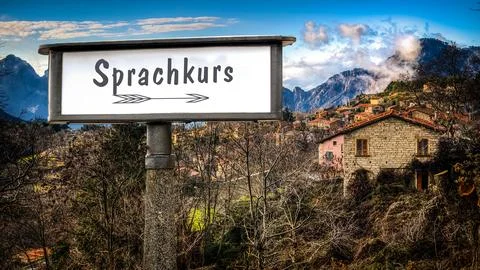 Signposts the direct way to Language course Foto stock