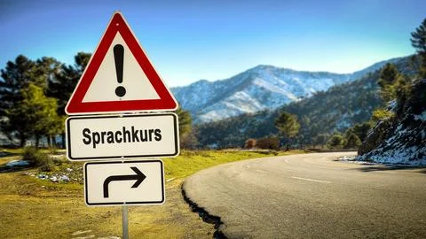 Signposts the direct way to Language course Foto stock