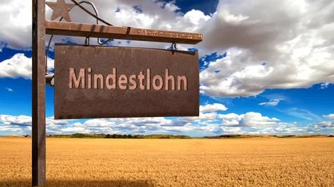 Signposts the direct way to minimum wage Foto stock