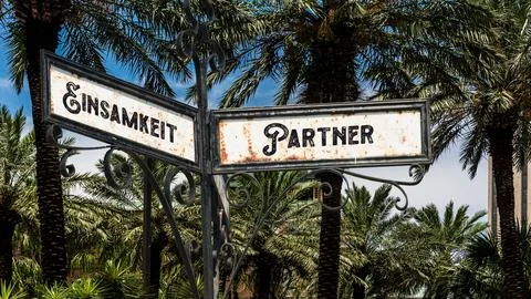 Signposts the direct way to partner versus loneliness Stock Photos