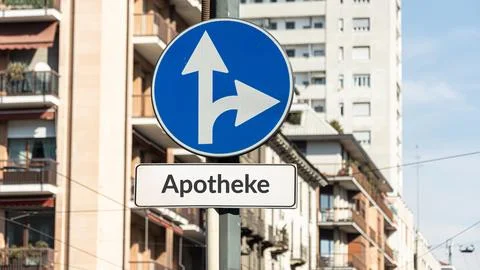 Signposts the direct way to the Pharmacy Foto stock