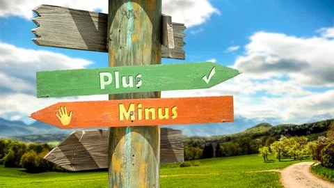 Signposts the direct way to plus versus minus Stock Photos