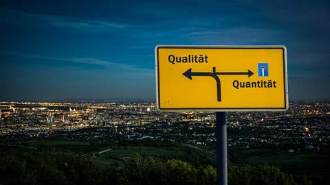 Signposts the direct way to quality versus quantity Stock Photos