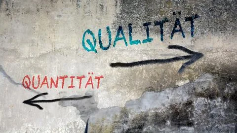 Signposts the direct way to quality versus quantity Stock Photos
