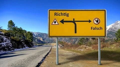 Signposts the direct way to right versus wrong Stock Photos