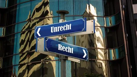 Signposts the direct way to right versus wrong Stock Photos