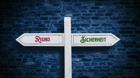 Signposts the direct way to safety versus risk Stock Photos