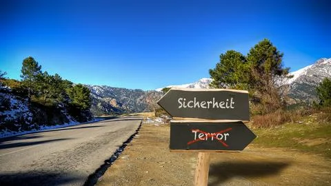 Signposts the direct way to security versus terror Stock-Fotos