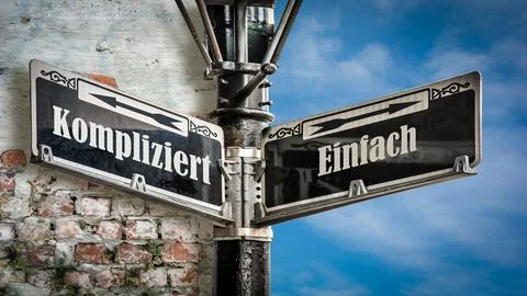Signposts the direct way to Simple versus Complicated Stock Photos