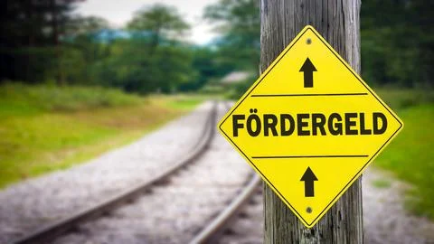 Signposts the direct way to subsidy Stock Photos